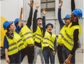 Workers with hands in the air